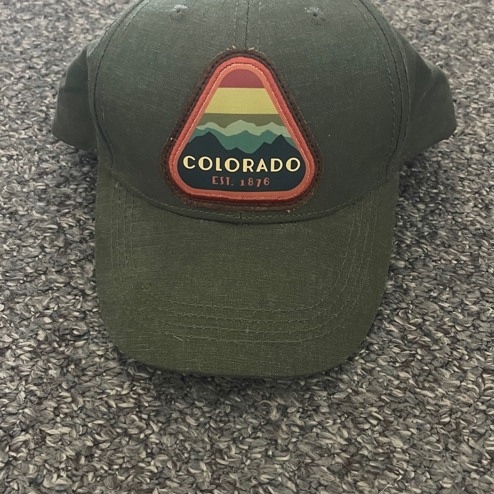 NWT Brand new, never Colorado green cloth baseball cap with mountain patch.